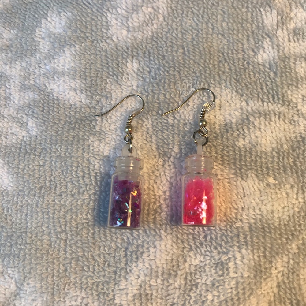 Pink and purple confetti filled earrings.